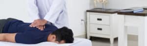Image of Brandon Man Being Treated for Work Injury by Chiropractor in Riverview FL