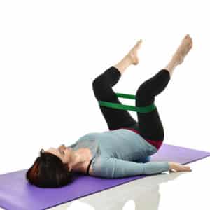 Riverview Woman Doing Physiotherapy Exercises at Brandon Chiropractor Office