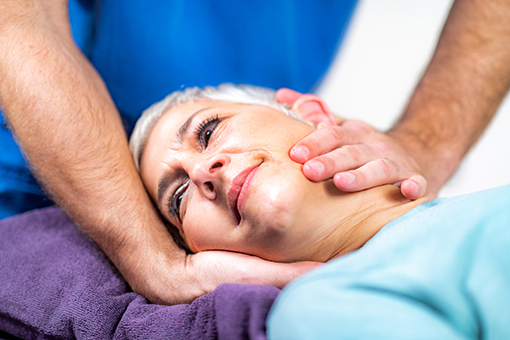 Lady Undergoing Whiplash Injury Treatment at a Chiropractor's Office in Brandon FL