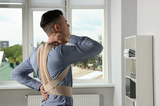 Man in Riverview Florida With Back Braces For Back Pain Treatment